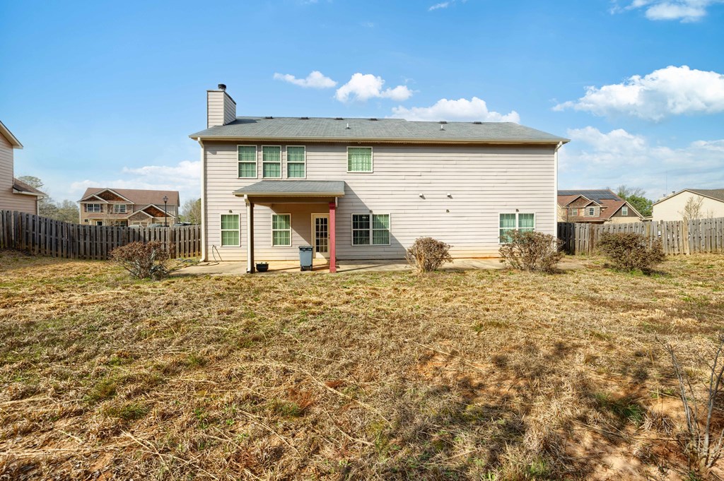 4936 Brightstar Lane Columbus, GA 31907 - Photo 40 of 42 a front view of a house with a yard
