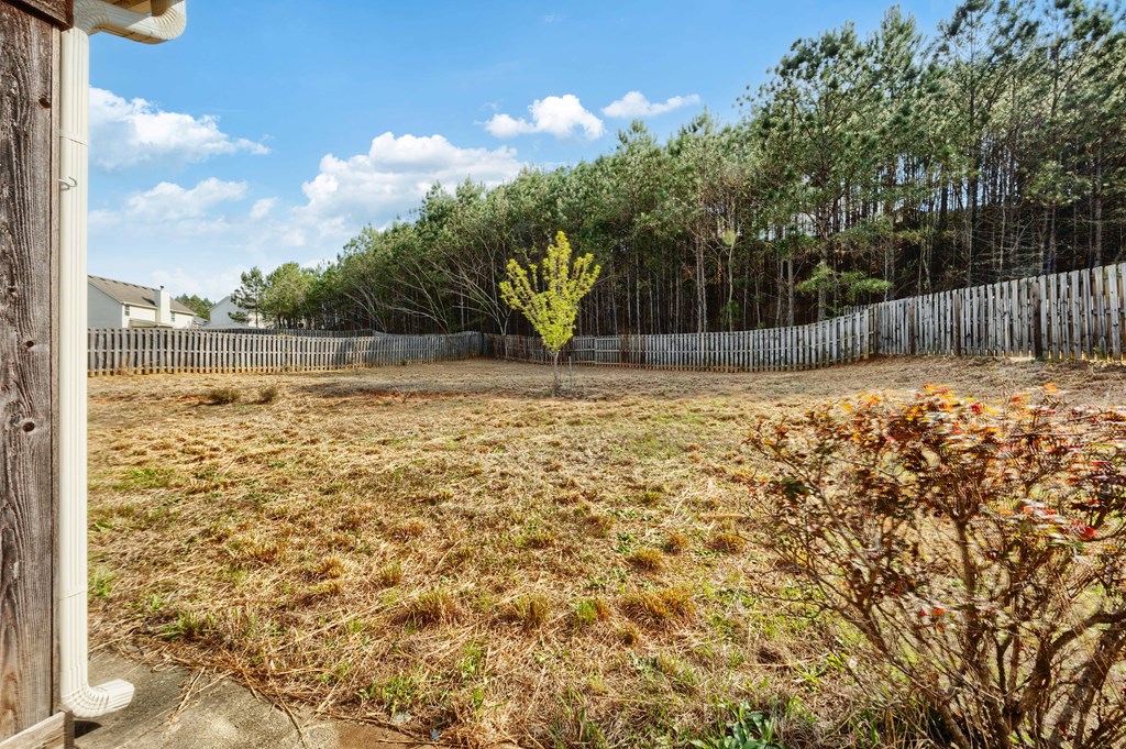 4936 Brightstar Lane Columbus, GA 31907 - Photo 41 of 42 a view of a yard with large trees