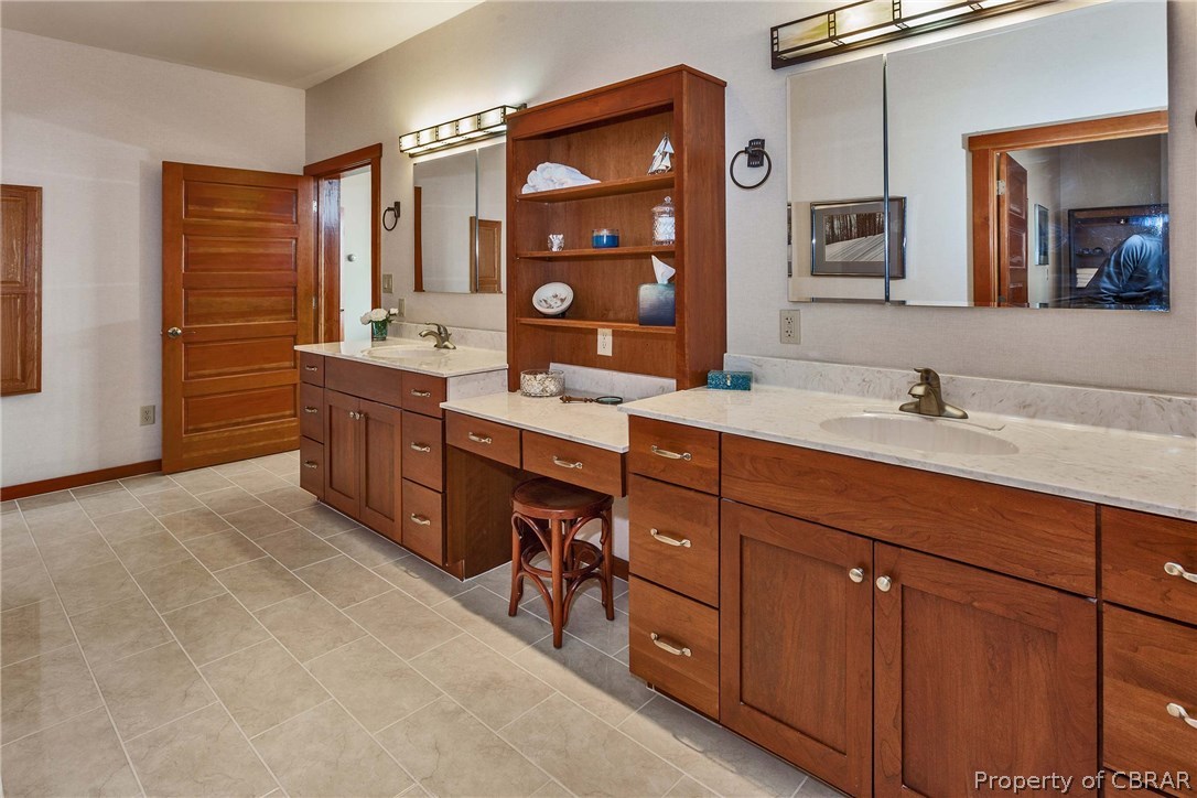 3678 Windmill Point Road White Stone, VA 22578 - Photo 24 of 50 Master bath with dual vanities and dressing table and tile flooring