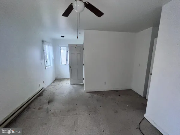 a view of entryway and hall with a window