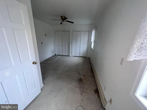 a view of a storage & utility room with a sink