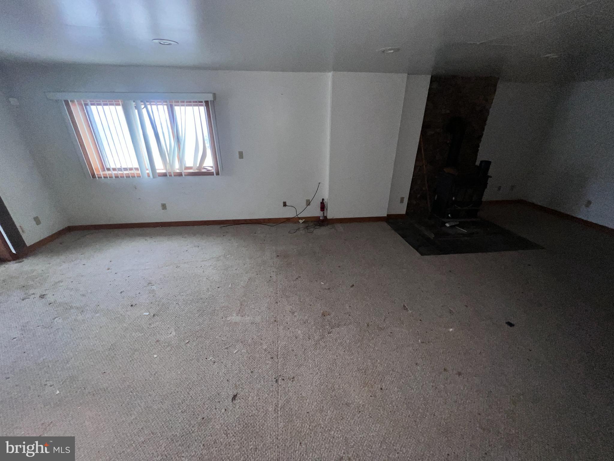 198 Pysell Road McHenry, MD 21541 - Photo 35 of 47 an empty room with windows