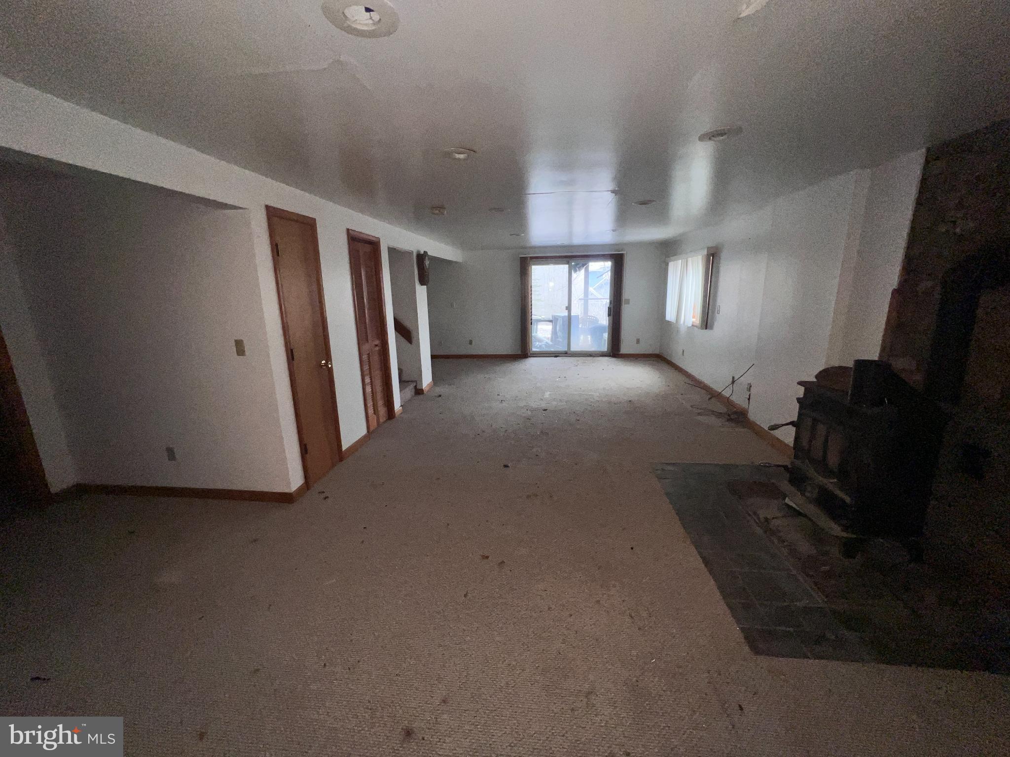 198 Pysell Road McHenry, MD 21541 - Photo 39 of 47 a view of empty room with windows