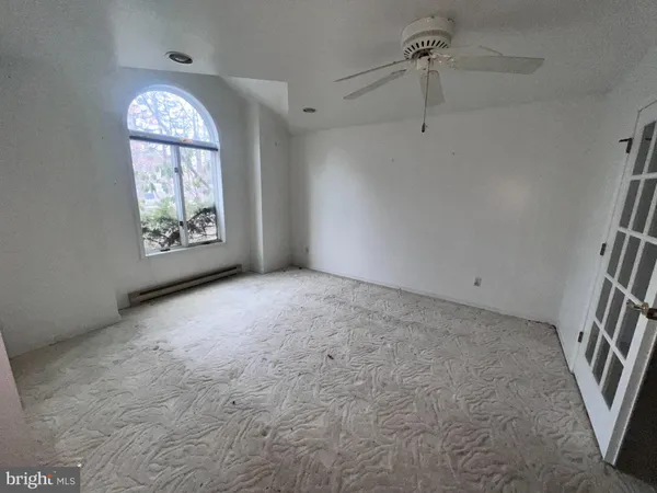 a view of a room with a garage