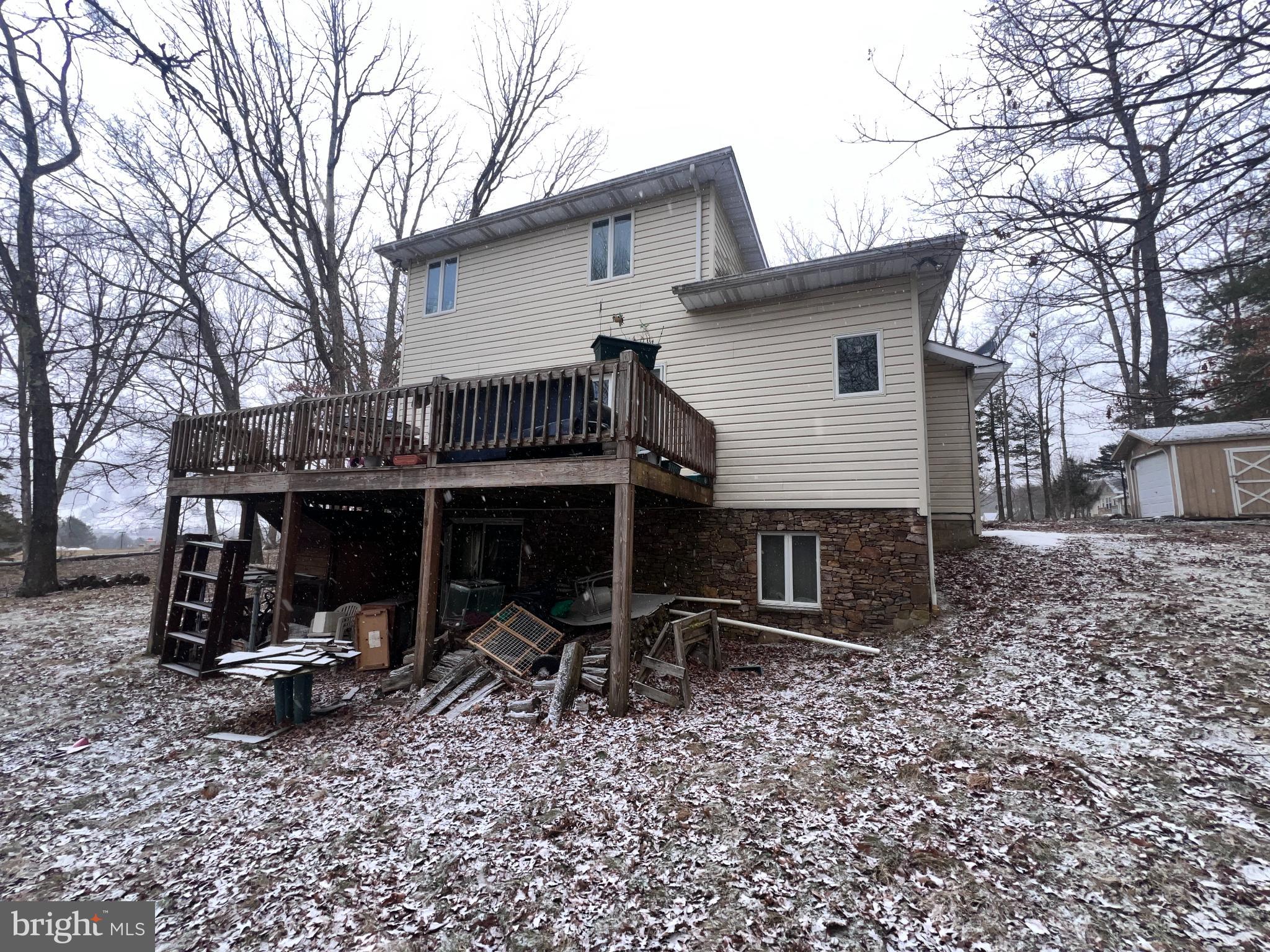 198 Pysell Road McHenry, MD 21541 - Photo 43 of 47 a view of a house with backyard and chairs