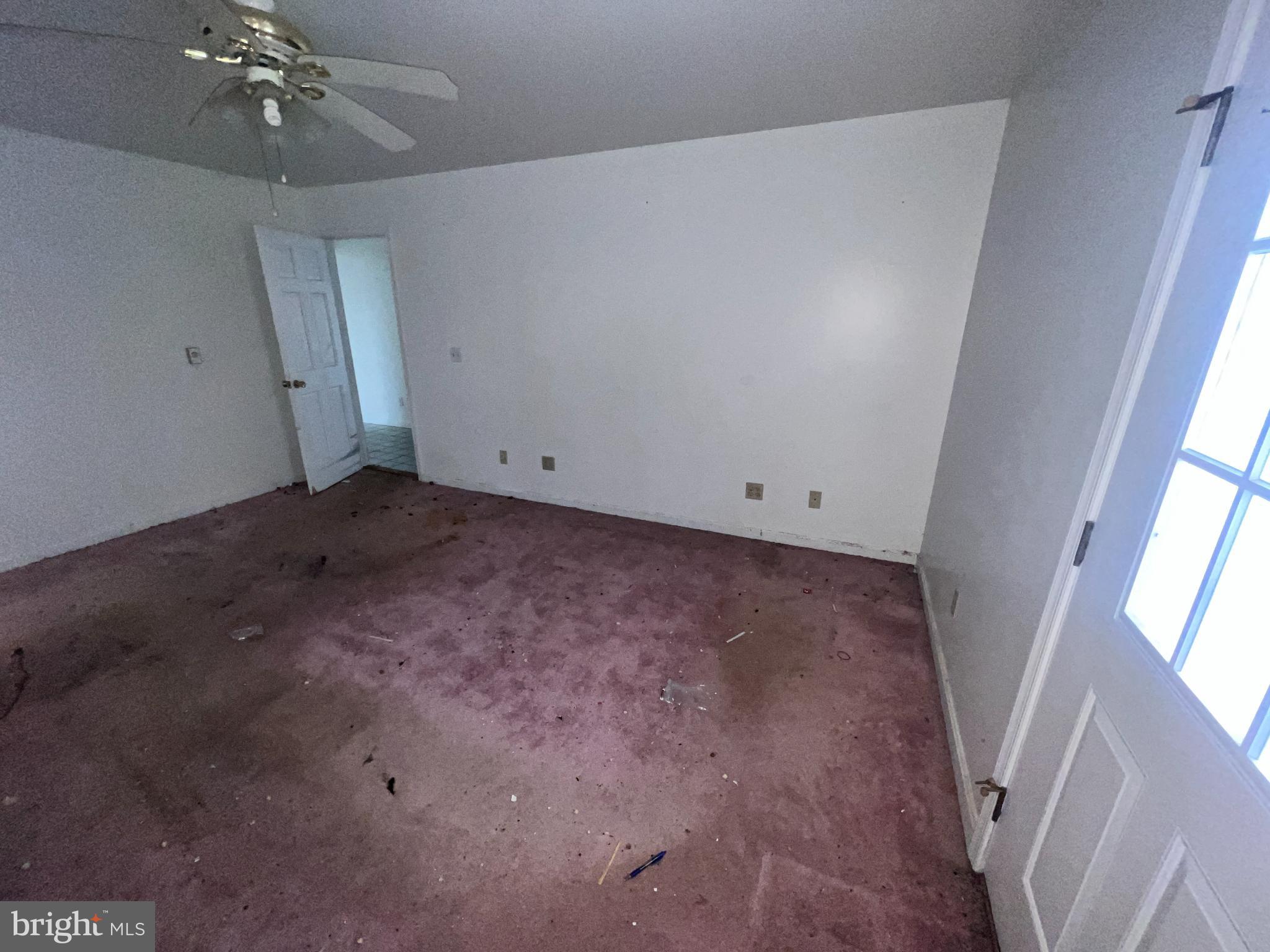 198 Pysell Road McHenry, MD 21541 - Photo 8 of 47 wooden floor in an empty room with a window