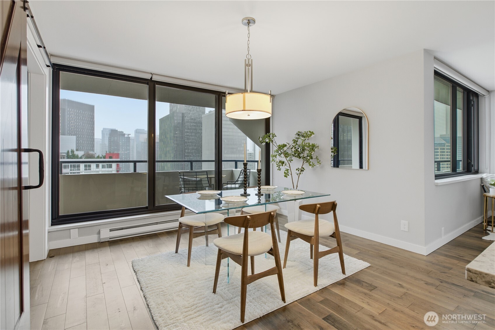2100 3rd Avenue, Unit 2606 Seattle, WA 98121 - Photo 11 of 37 a dining room with furniture and window