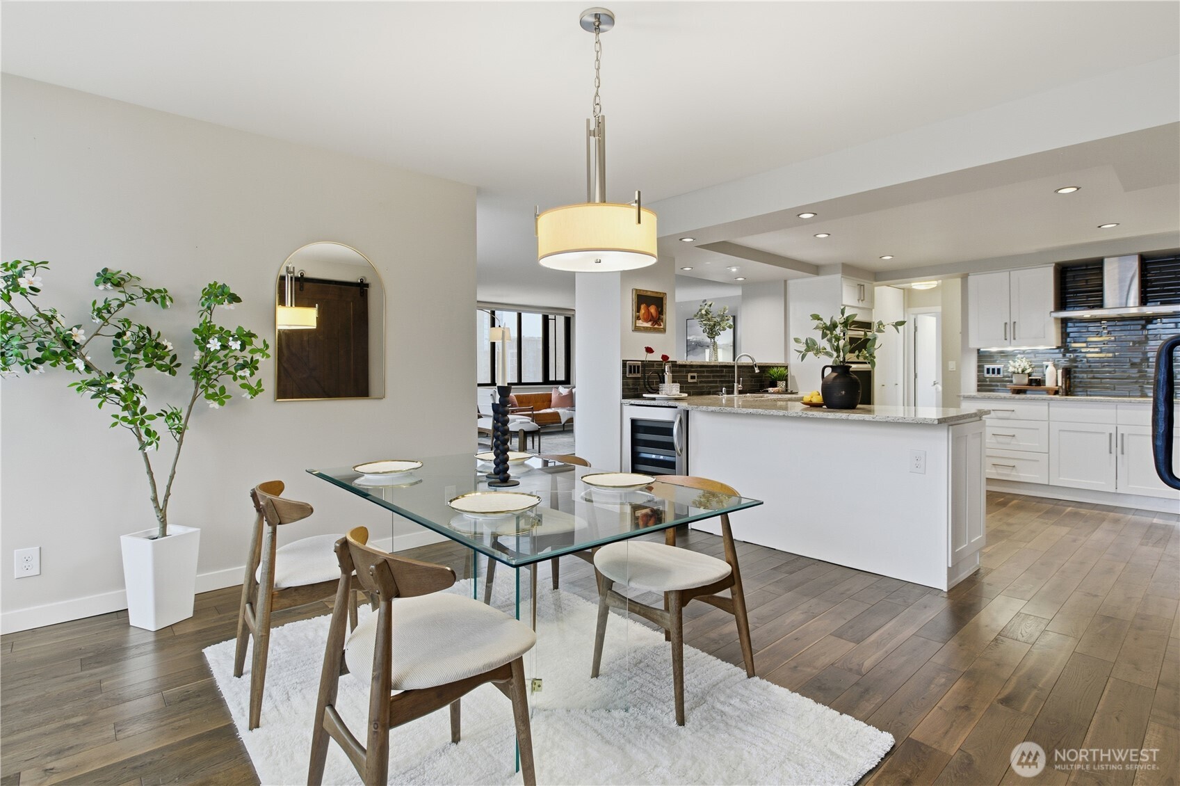 2100 3rd Avenue, Unit 2606 Seattle, WA 98121 - Photo 14 of 37 a dining room with furniture and wooden floor