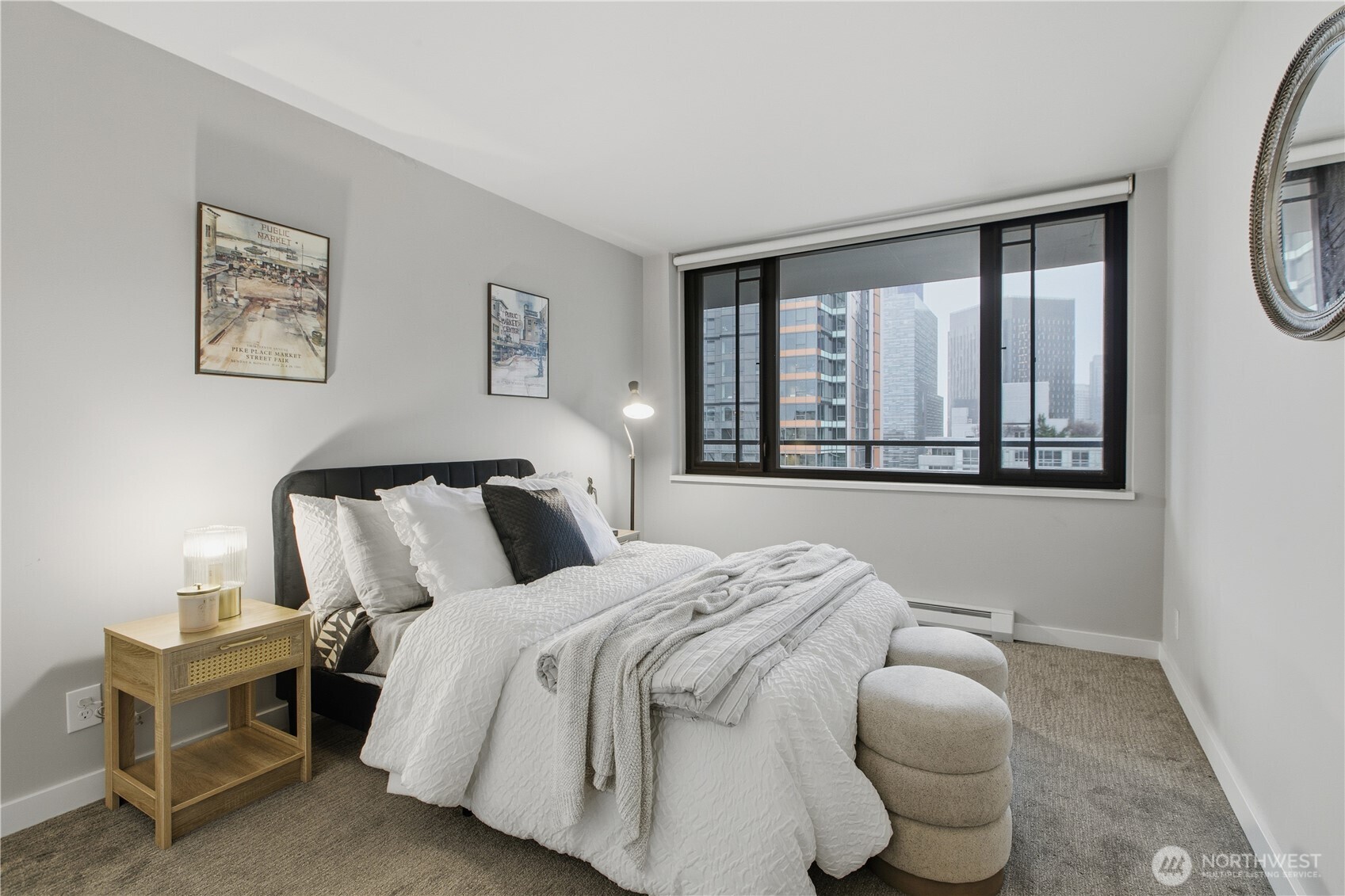 2100 3rd Avenue, Unit 2606 Seattle, WA 98121 - Photo 23 of 37 a bedroom with a bed and a large window