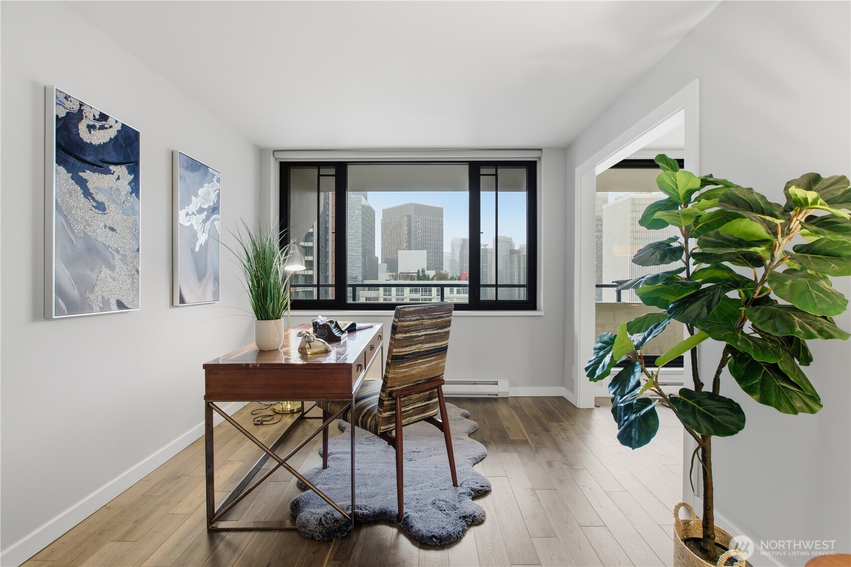 2100 3rd Avenue, Unit 2606 Seattle, WA 98121 - Photo 26 of 37 a room with furniture and a potted plant