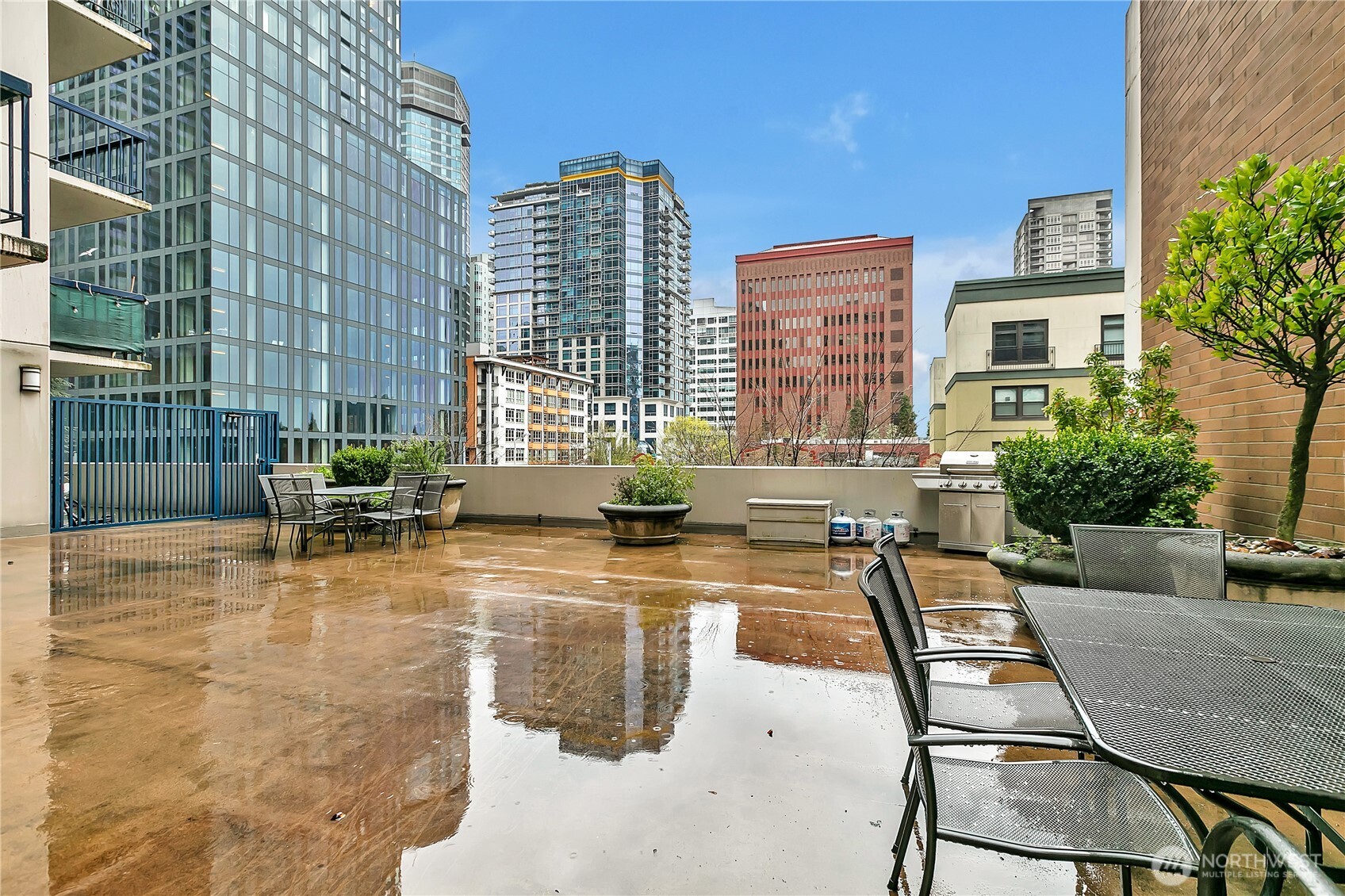 2100 3rd Avenue, Unit 2606 Seattle, WA 98121 - Photo 34 of 37 a view of a swimming pool with chairs