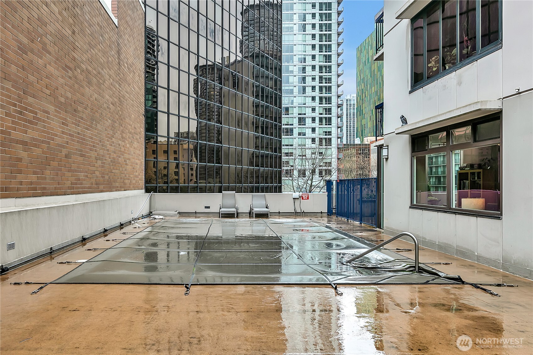 2100 3rd Avenue, Unit 2606 Seattle, WA 98121 - Photo 35 of 37 a view of a kitchen with granite countertop a sink and a window