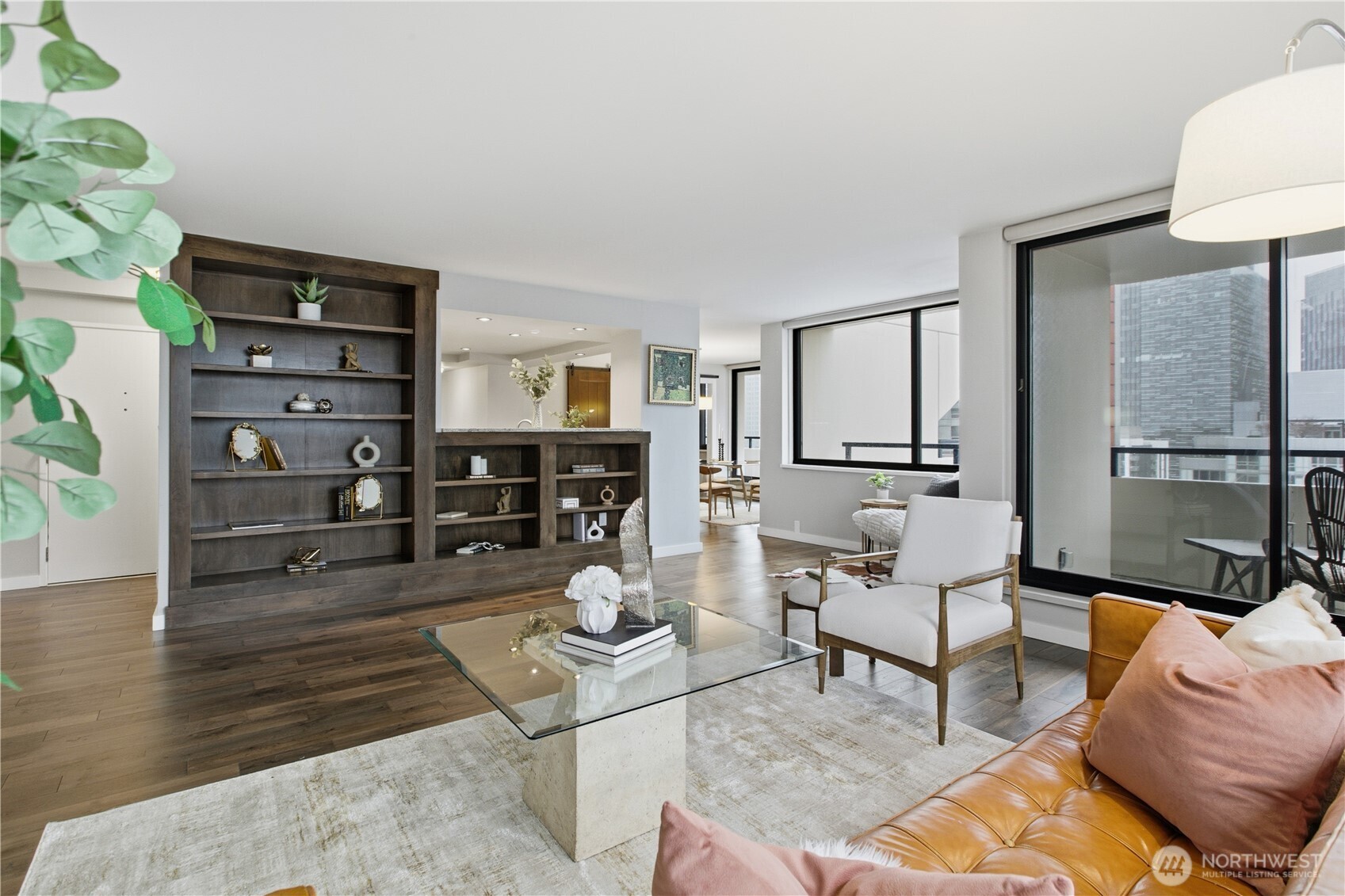 2100 3rd Avenue, Unit 2606 Seattle, WA 98121 - Photo 5 of 37 a living room with furniture a lamp and a rug