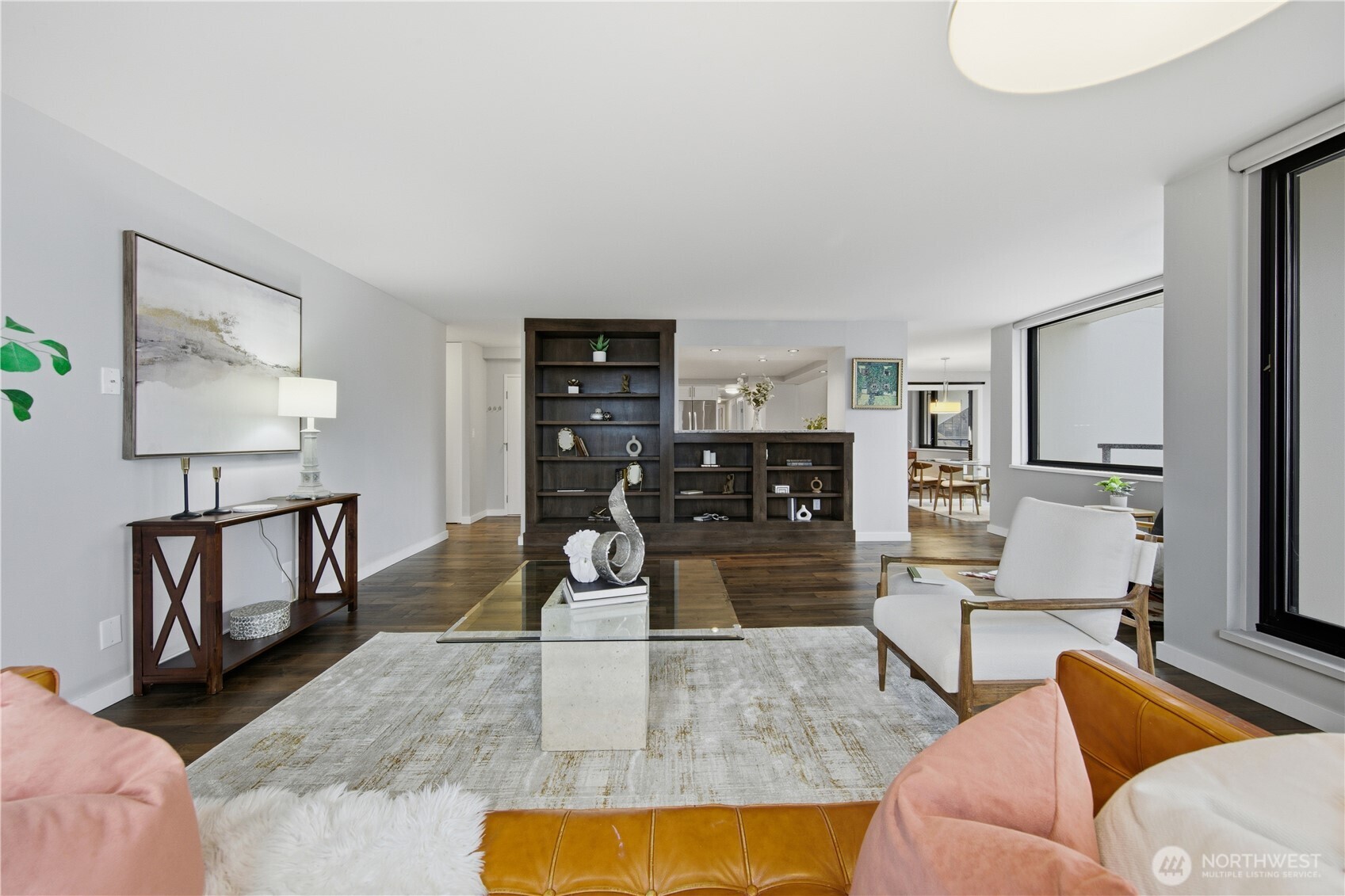 2100 3rd Avenue, Unit 2606 Seattle, WA 98121 - Photo 8 of 37 a living room with furniture and a wooden floor