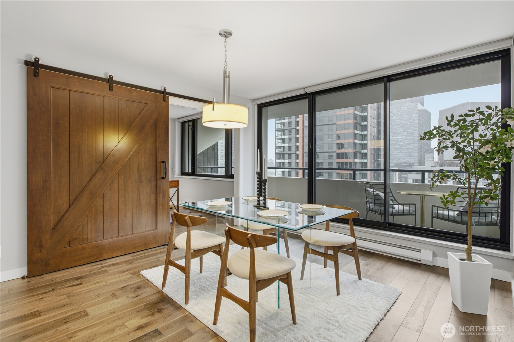 2100 3rd Avenue, Unit 2606 Seattle, WA 98121 - Photo 10 of 37 a dining room with furniture and window
