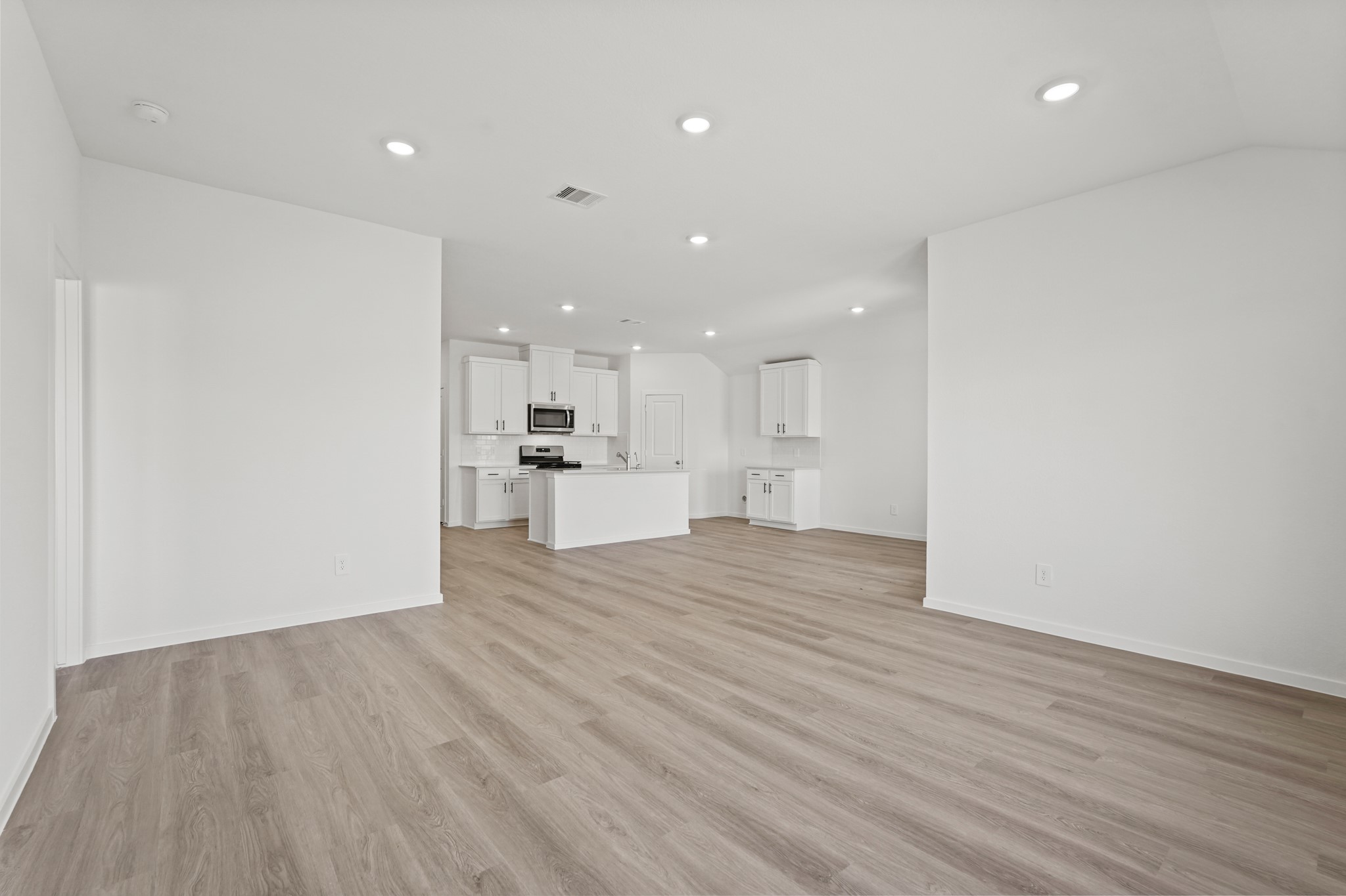 541 Wax Myrtle Way Hockley, TX 77447 - Photo 8 of 19 a view of kitchen with wooden floor
