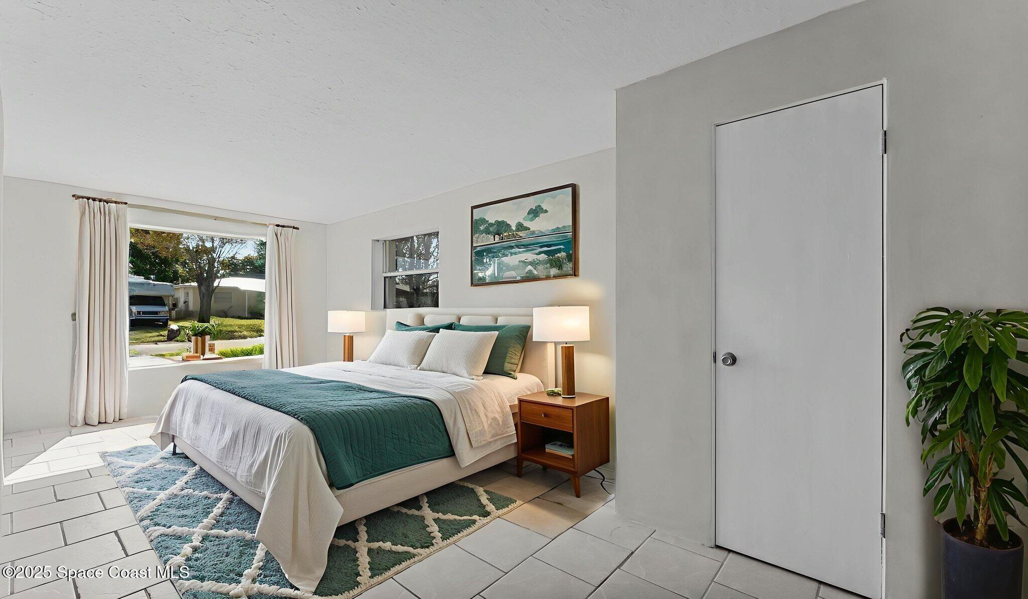 2448 Delaware Drive Melbourne, FL 32935 - Photo 11 of 27 Virtually Staged Main Bedroom