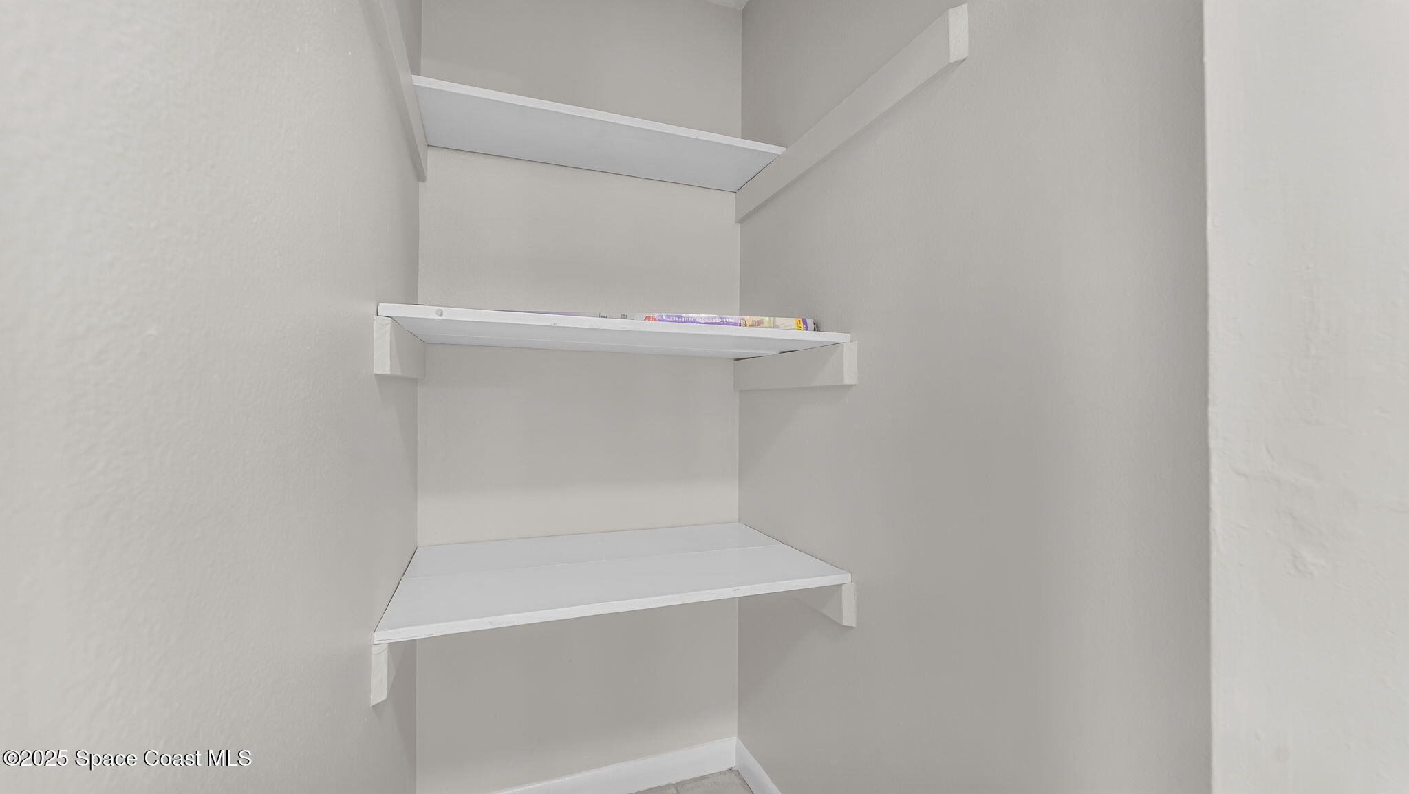 2448 Delaware Drive Melbourne, FL 32935 - Photo 19 of 27 Storage in Laundry