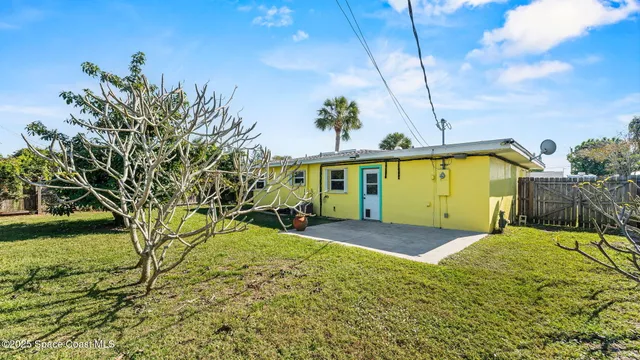 a view of swimming pool with a yard