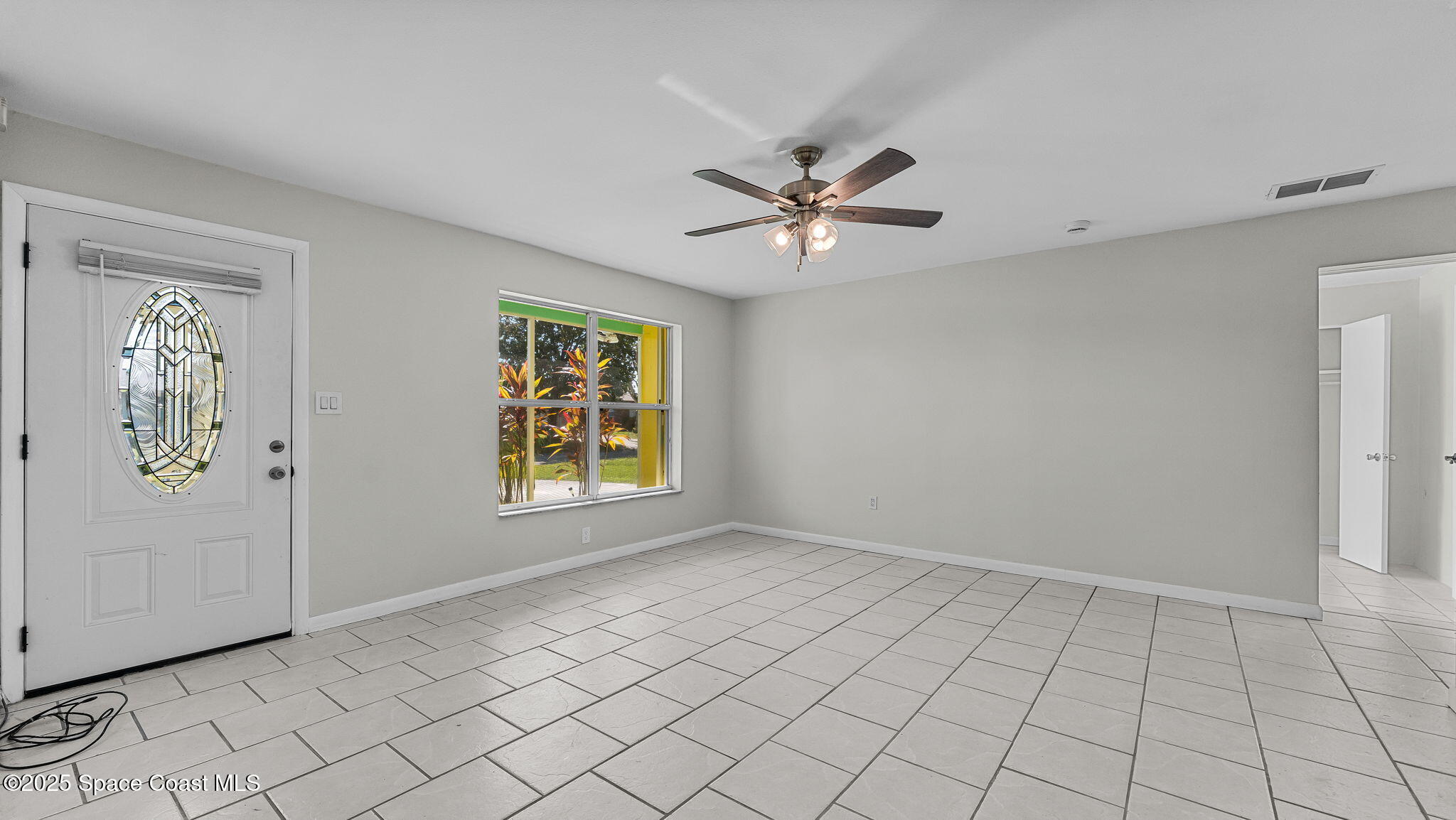 2448 Delaware Drive Melbourne, FL 32935 - Photo 26 of 27 Living Room