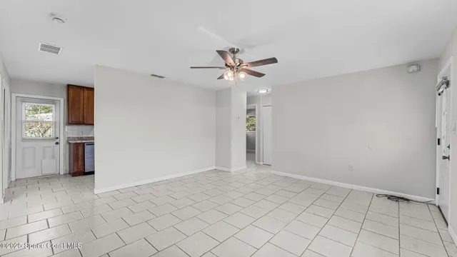 a view of an empty room and window