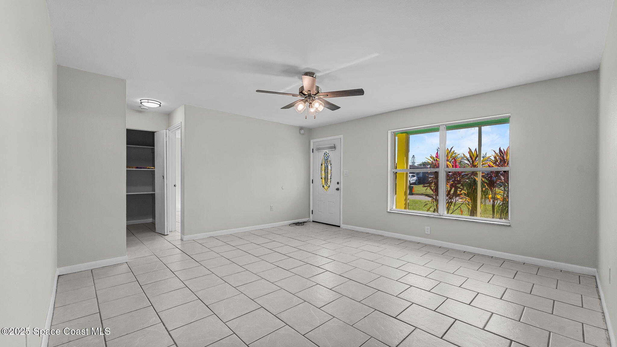2448 Delaware Drive Melbourne, FL 32935 - Photo 6 of 27 LR View from Kitchen