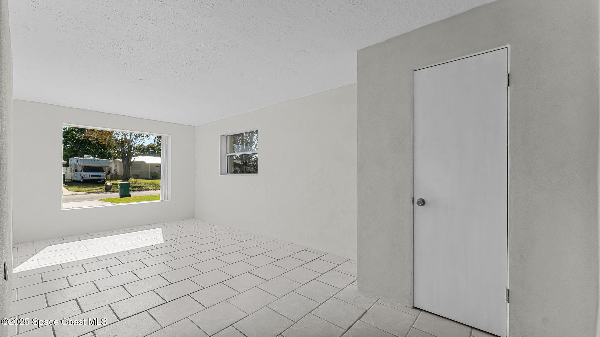 2448 Delaware Drive Melbourne, FL 32935 - Photo 10 of 27 Main Bedroom from Door