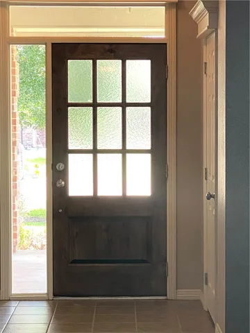 a view of room with window and hardwood floor