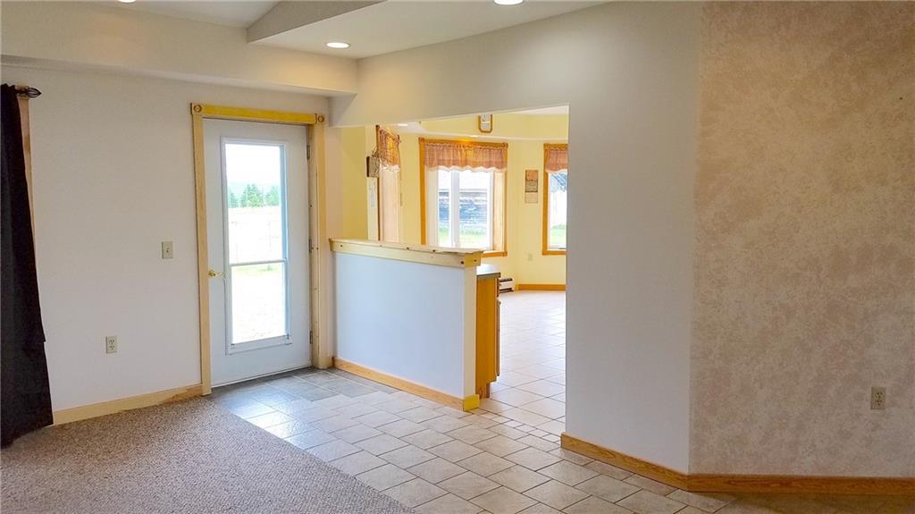 2269 Chapman Road Mapleton, ME 04757 - Photo 7 of 35 View from living room into the kitchen.
