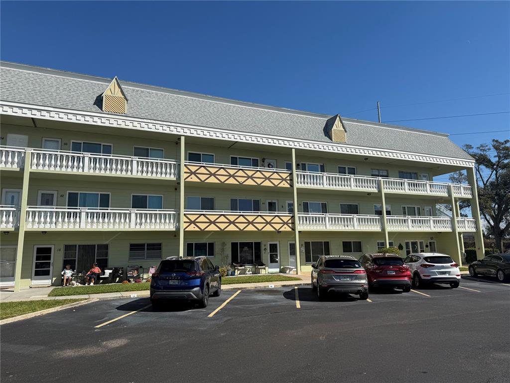 a car parked in front of a building