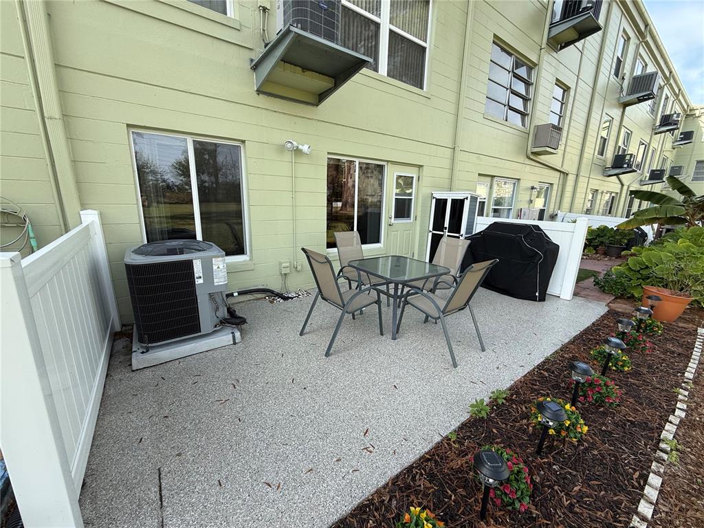2460 Canadian Way, Unit 22 Clearwater, FL 33763 - Photo 30 of 42 a building outdoor space with seating space