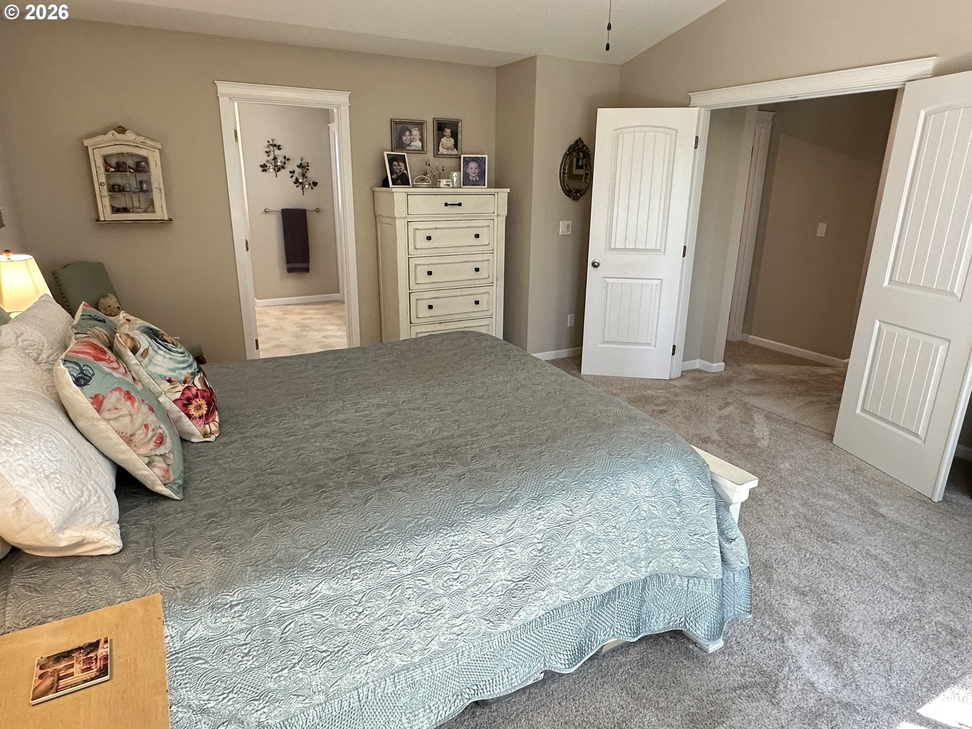 59290 Forest Trail Circle St. Helens, OR 97051 - Photo 17 of 33 a spacious bedroom with a bed and closet