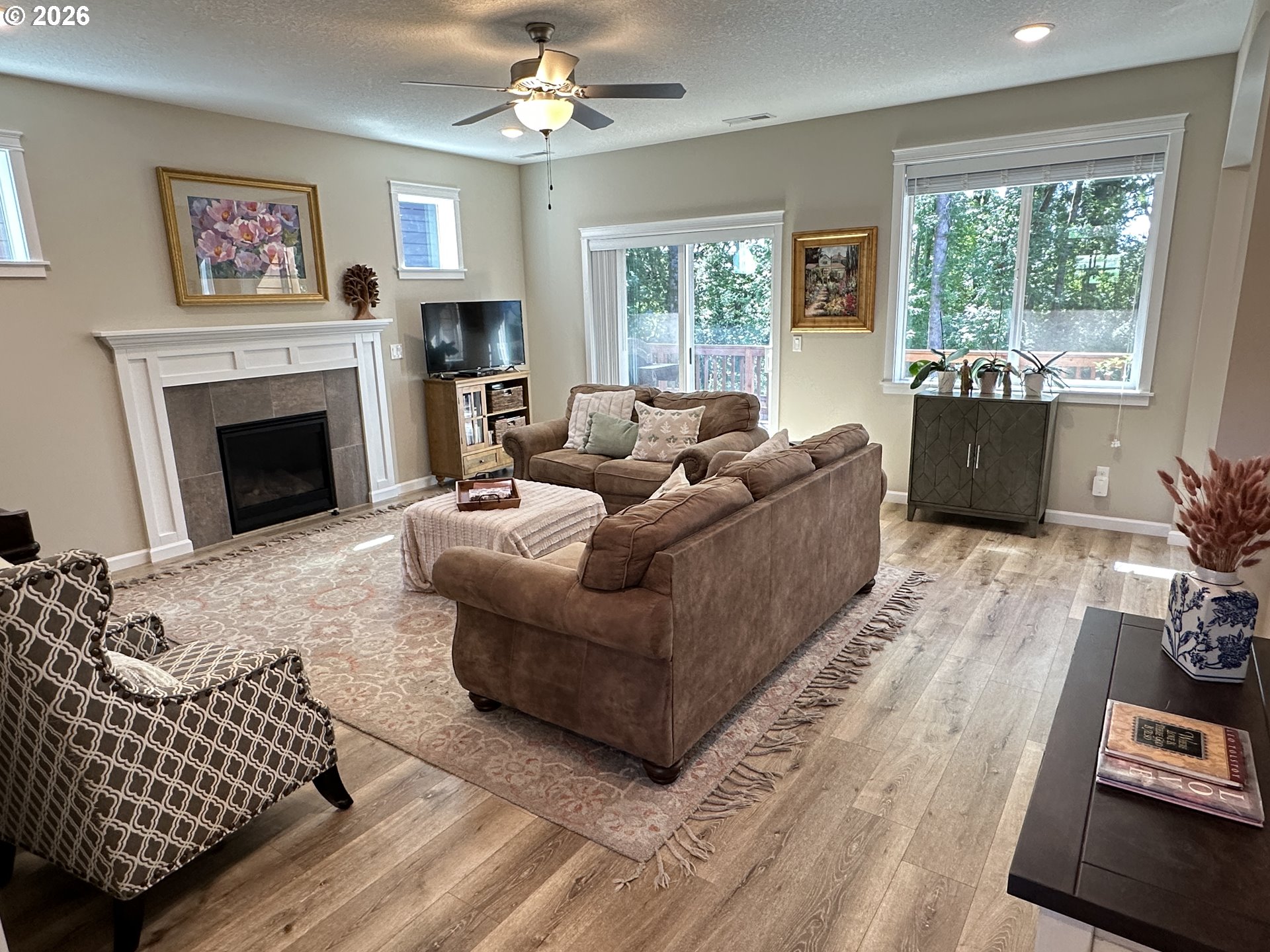 59290 Forest Trail Circle St. Helens, OR 97051 - Photo 2 of 33 a living room with furniture and a fireplace