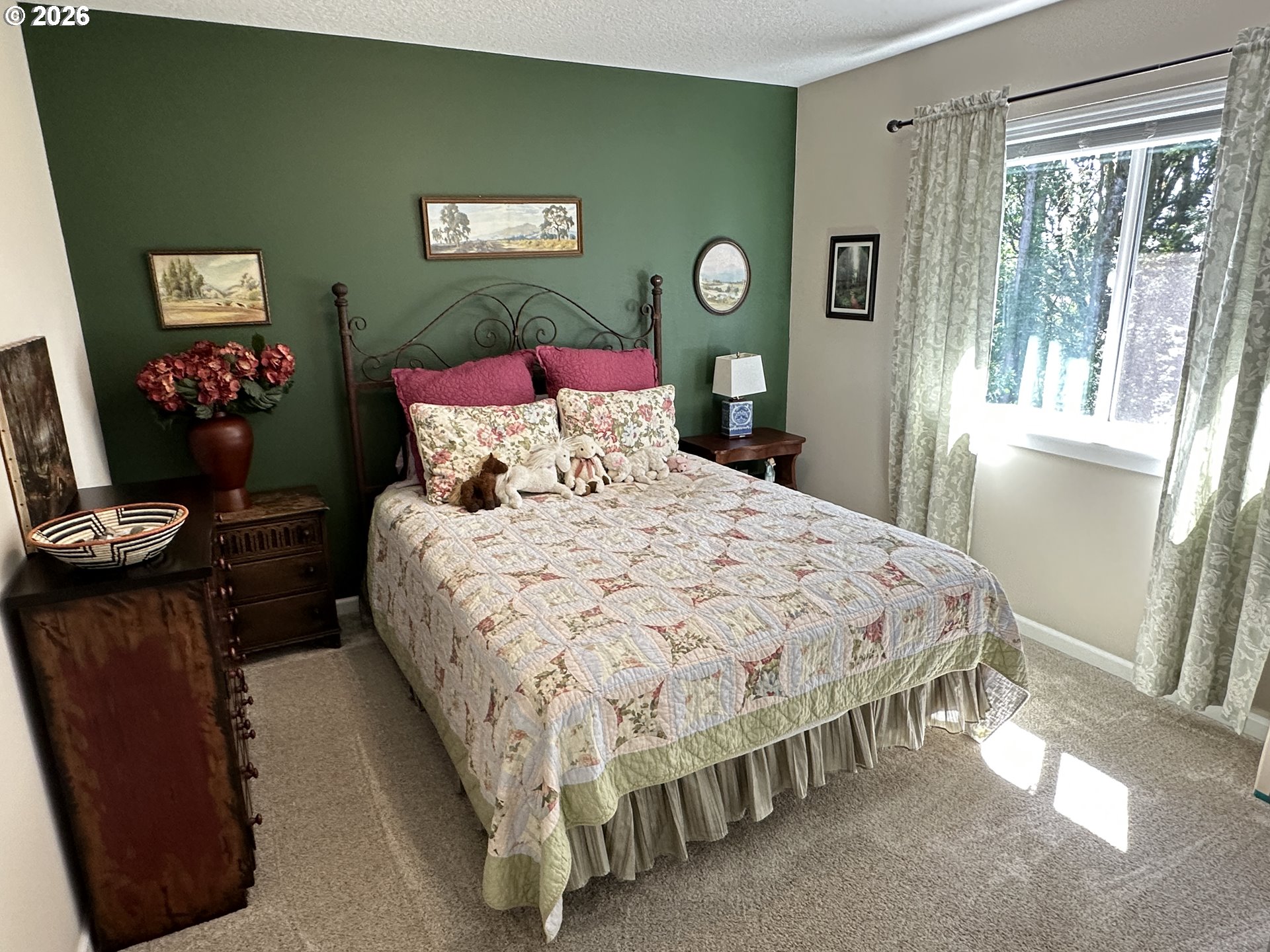 59290 Forest Trail Circle St. Helens, OR 97051 - Photo 24 of 33 a bedroom with a bed and a window