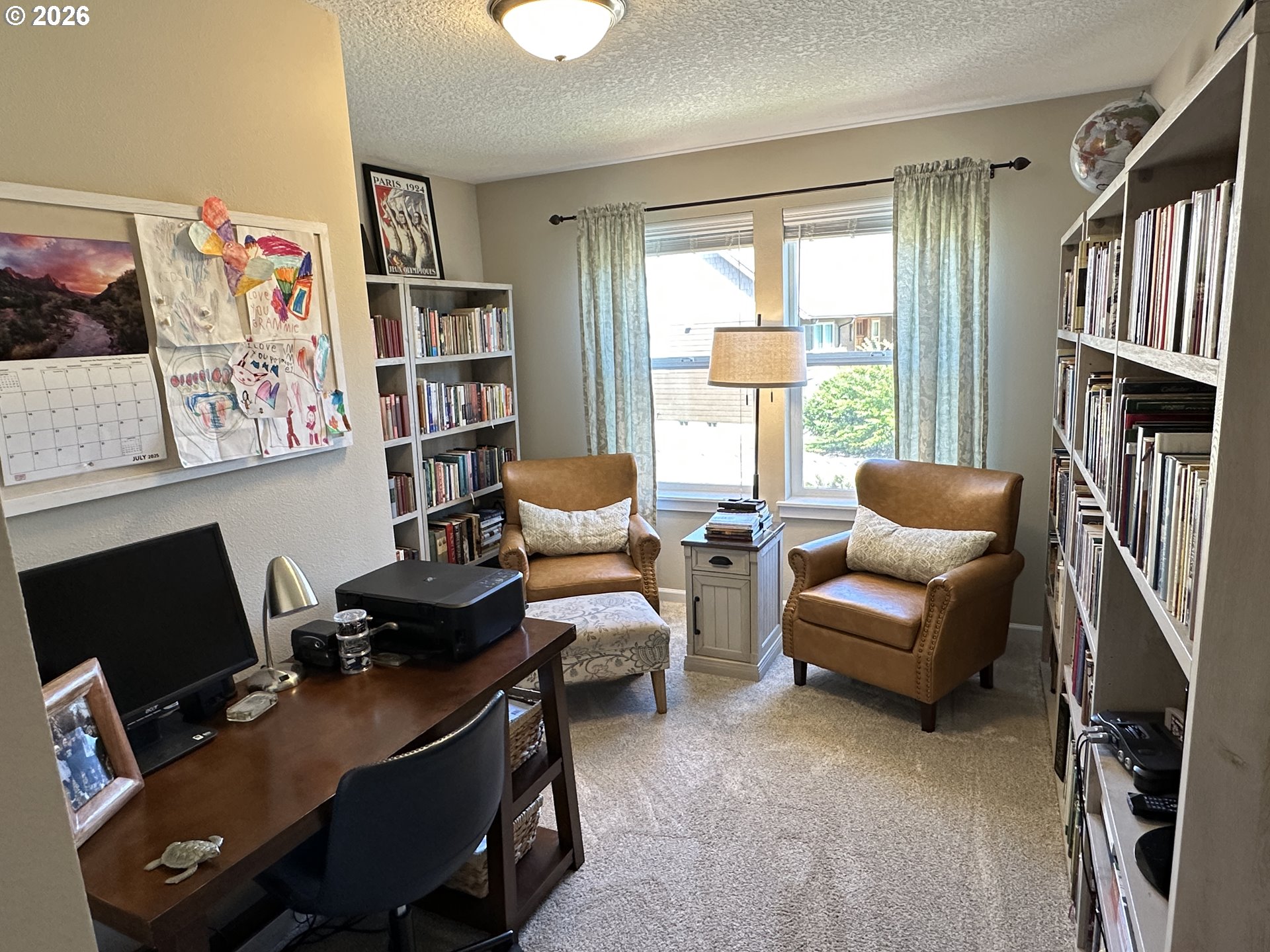 59290 Forest Trail Circle St. Helens, OR 97051 - Photo 26 of 33 a view of a livingroom with workspace and a window