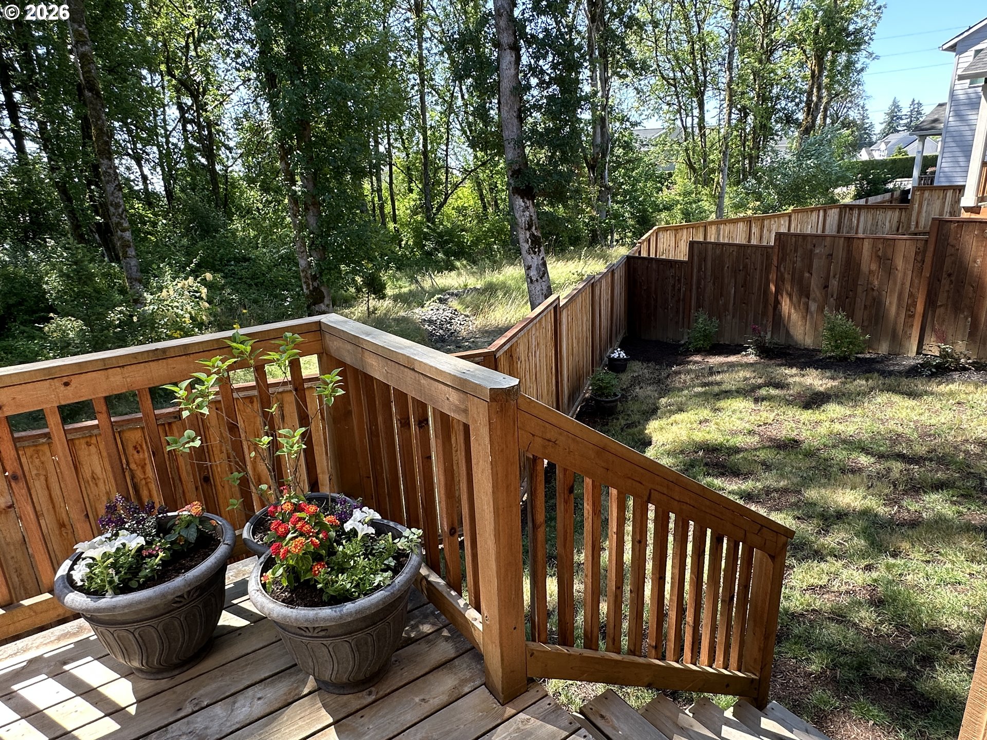59290 Forest Trail Circle St. Helens, OR 97051 - Photo 28 of 33 a view of a chair and tables in the balcony