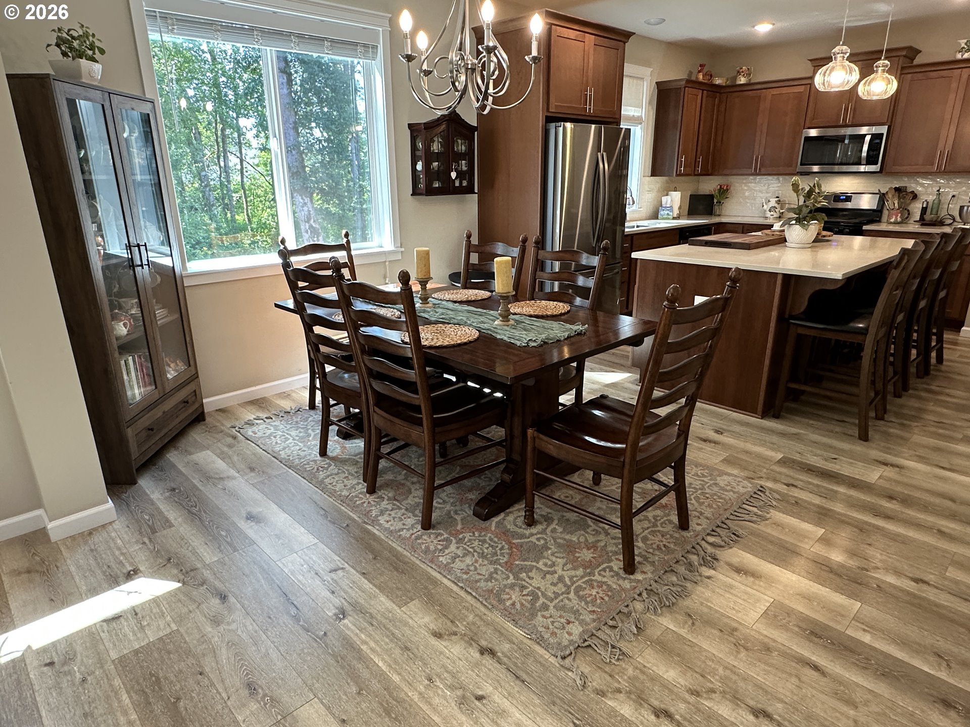59290 Forest Trail Circle St. Helens, OR 97051 - Photo 5 of 33 a view of a dining room with furniture window and outside view
