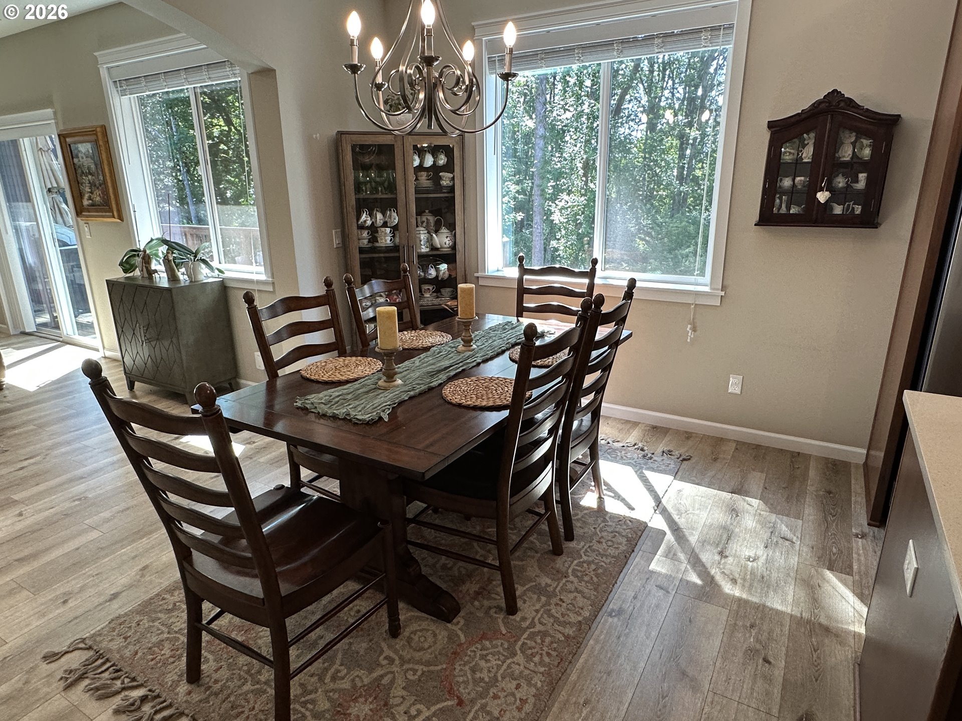 59290 Forest Trail Circle St. Helens, OR 97051 - Photo 6 of 33 a view of a dining room with furniture window and outside view