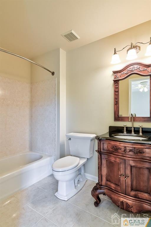 124 Five Points Road Freehold, NJ 07728 - Photo 1 of 1 a bathroom with a sink a toilet and a bathtub