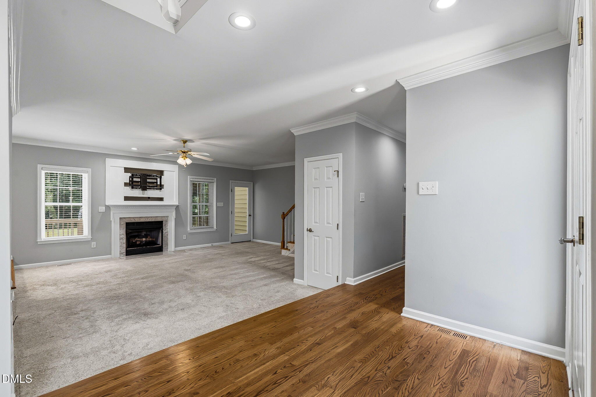 1112 Tyler Farms Drive Raleigh, NC 27603 - Photo 12 of 78 an empty room with a fireplace and window
