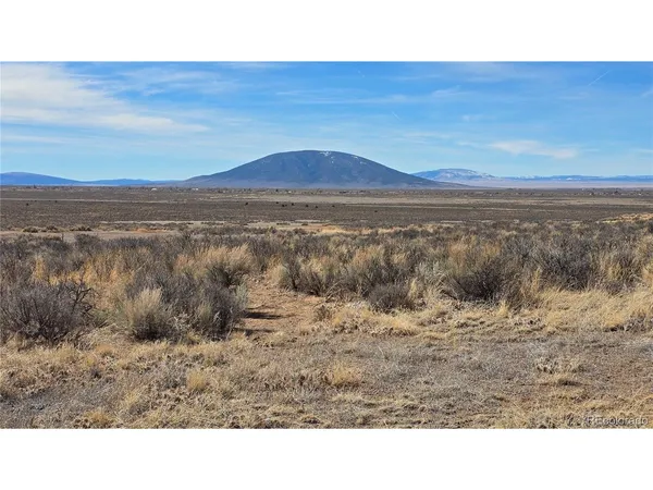 a view of an outdoor space and mountain view