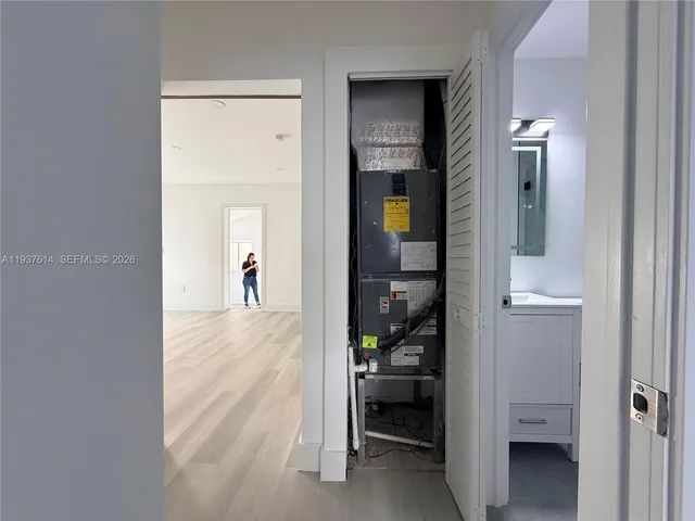 a view of a bedroom from a hallway