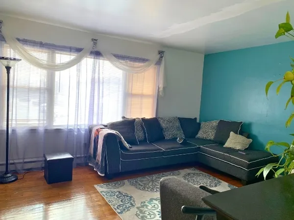 a kitchen with a table and chairs in it