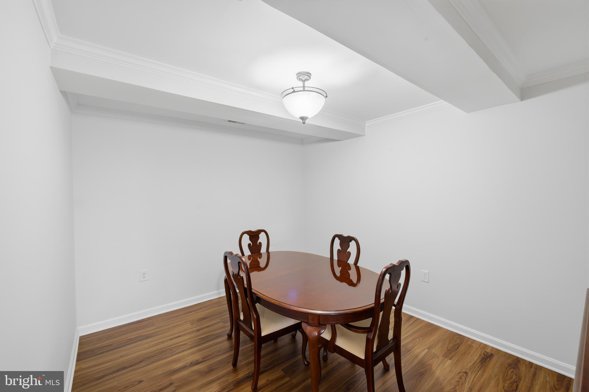 12240 Roundwood Road, Unit 605 Lutherville-Timonium, MD 21093 - Photo 11 of 38 Formal dining room tucked off LR & KIT