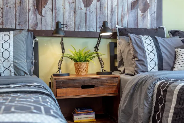 a view of front door and bedroom