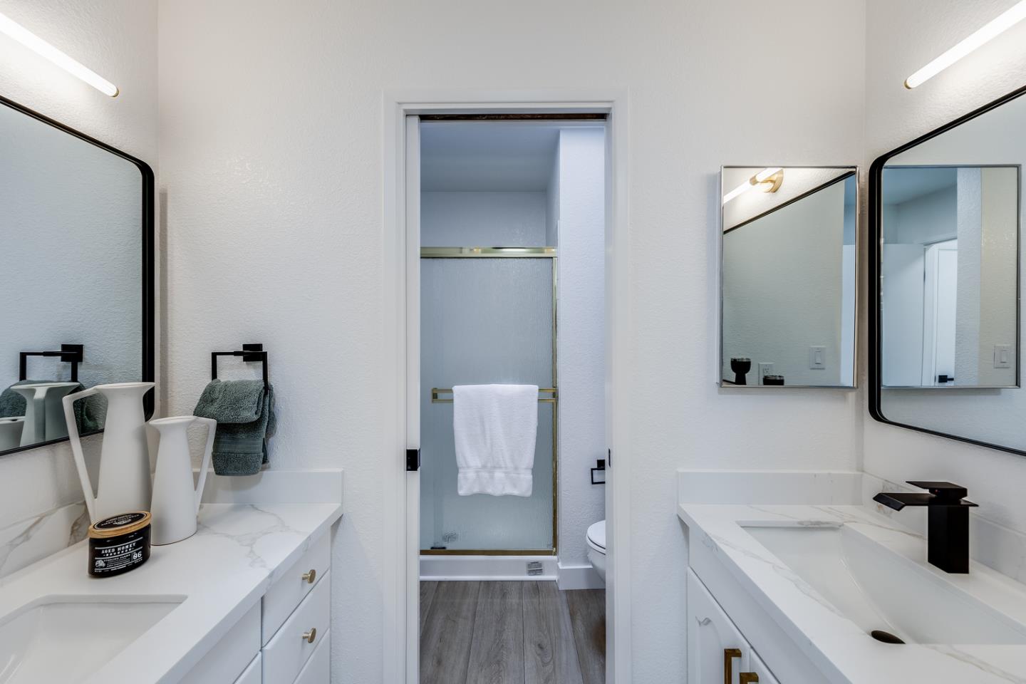 645 Sharp Park Road Pacifica, CA 94044 - Photo 17 of 34 a bathroom with a sink and a mirror