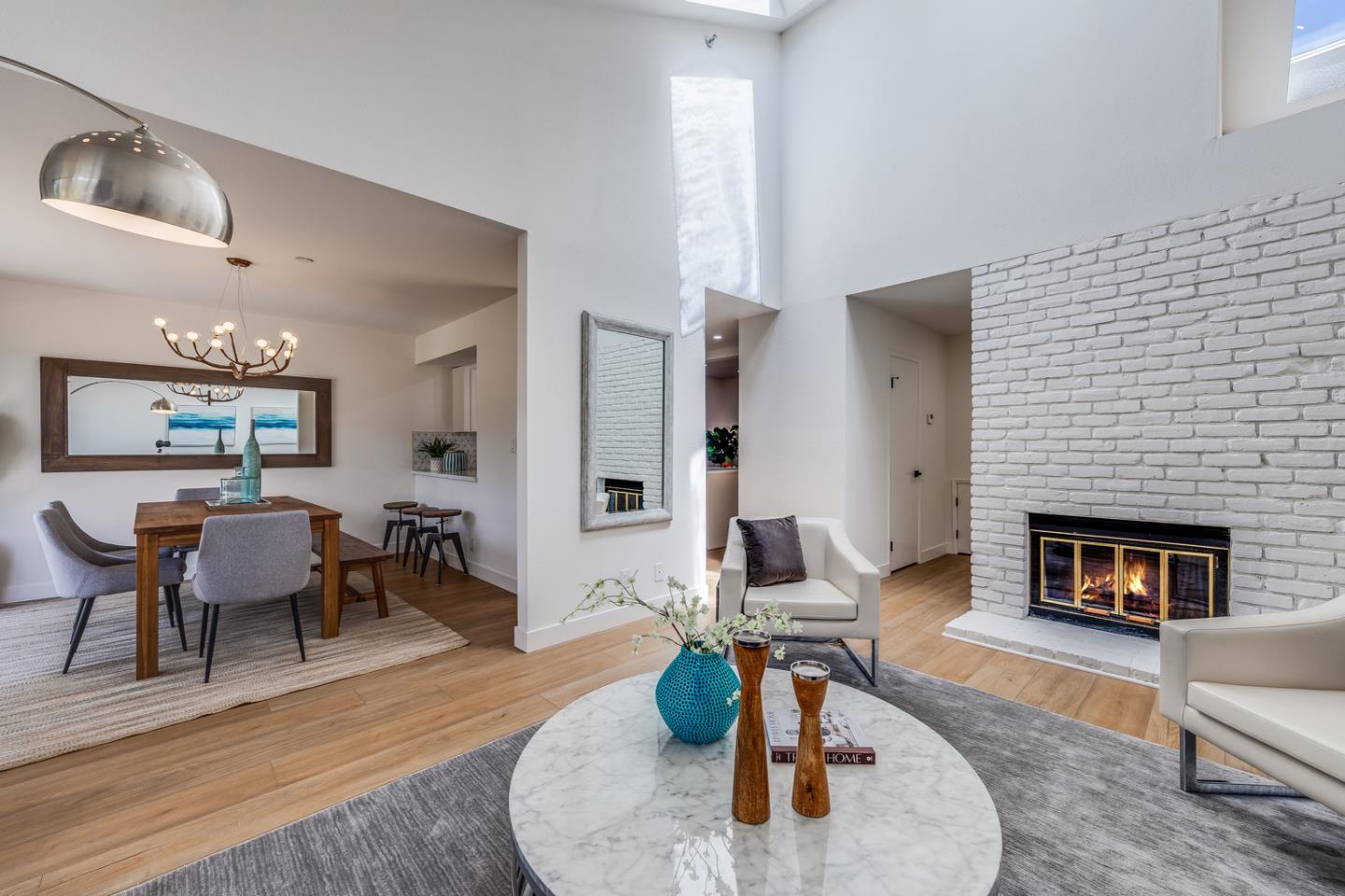645 Sharp Park Road Pacifica, CA 94044 - Photo 7 of 34 a living room with furniture and a fireplace