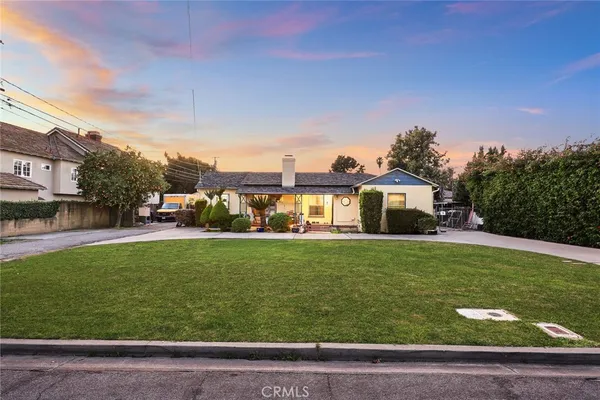 a view of a house with a big yard