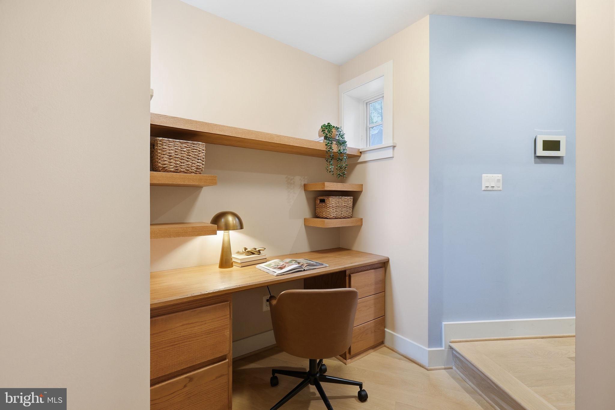1301 Potomac Avenue Southeast, Unit 2 Washington, DC 20003 - Photo 21 of 30 a workspace with furniture and window