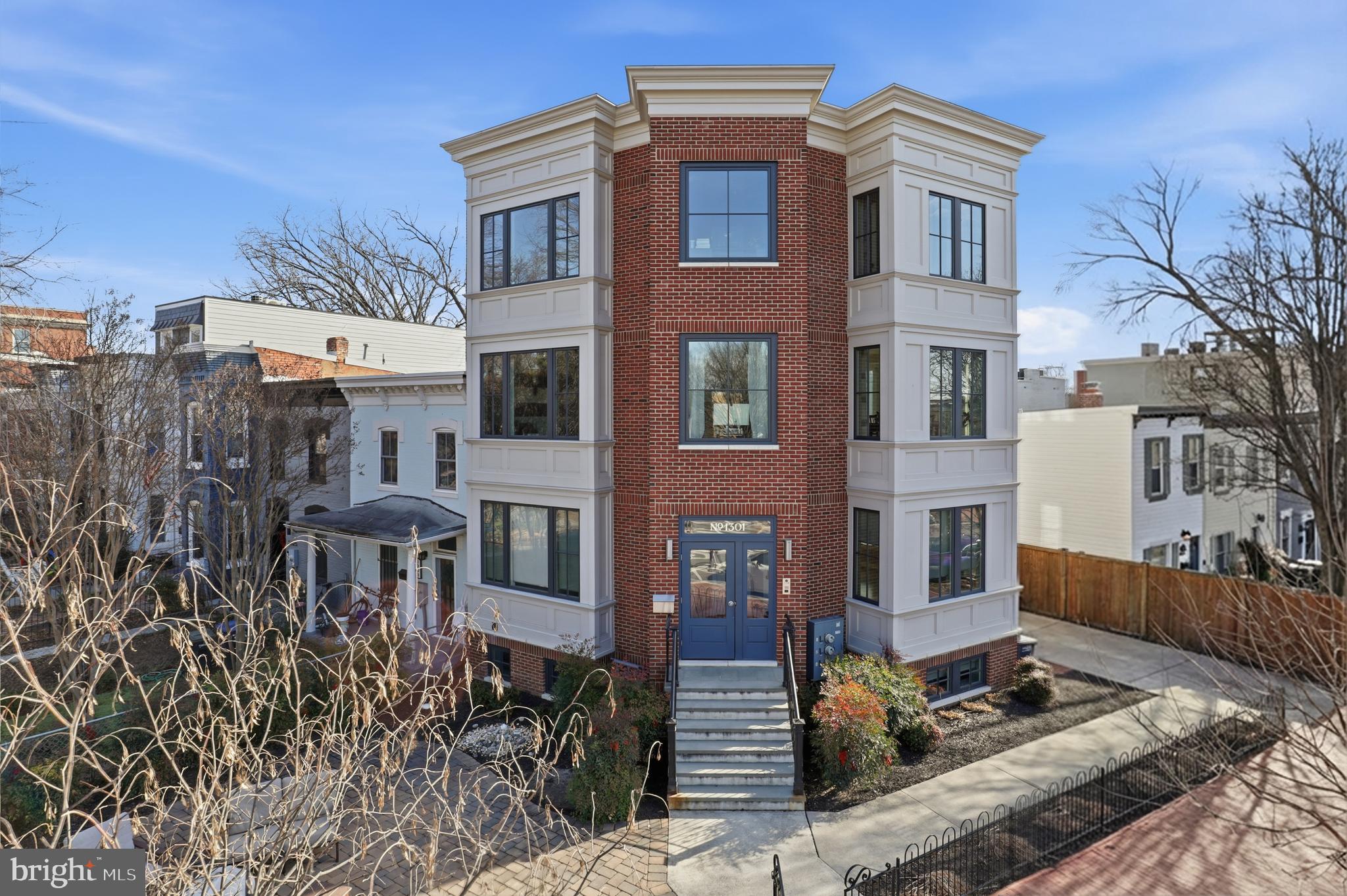 1301 Potomac Avenue Southeast, Unit 2 Washington, DC 20003 - Photo 23 of 30 a front view of a house with a yard